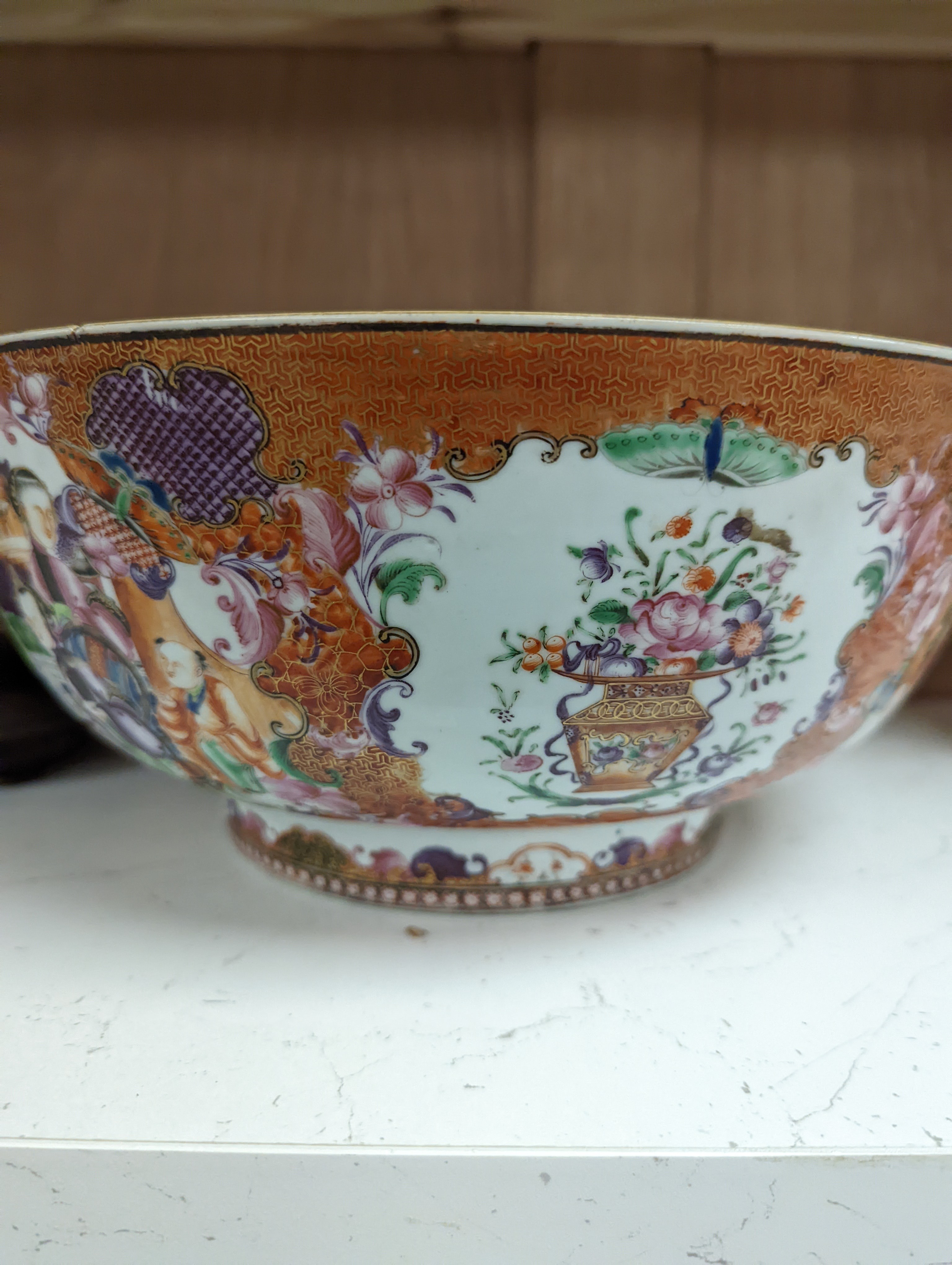 An 18th century Chinese export mandarin pattern porcelain bowl with hardwood stand 28.5cm diameter